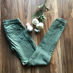 Refuge: light olive green skinny jeans